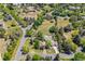 Aerial view showcasing mature landscaping, mature trees and well-maintained lawn at 4500 S Dasa Dr, Cherry Hills Village, CO 80111