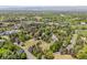Aerial view of the property showing large lot with mature trees in a lovely neighborhood at 4500 S Dasa Dr, Cherry Hills Village, CO 80111