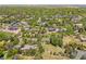 Aerial view of the property and surrounding neighborhood with mature trees and landscaping at 4500 S Dasa Dr, Cherry Hills Village, CO 80111