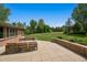 Expansive backyard view showcasing the well-manicured lawn and mature trees at 4500 S Dasa Dr, Cherry Hills Village, CO 80111