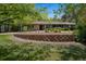 Beautiful landscaping and brickwork frame this home with lush front yard at 4500 S Dasa Dr, Cherry Hills Village, CO 80111