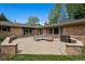 Large brick patio with plenty of seating and space for entertaining at 4500 S Dasa Dr, Cherry Hills Village, CO 80111