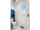 Cozy half bathroom with a modern toilet, vanity, and stylish finishes creating a practical space at 16362 E 111Th Dr, Commerce City, CO 80022