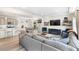 Open-concept living area seamlessly connects the kitchen, dining, and living spaces at 16362 E 111Th Dr, Commerce City, CO 80022