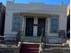 Charming duplex featuring classic architecture, inviting front porch, and well-maintained exterior for curb appeal at 3325 Navajo St, Denver, CO 80211