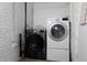 Functional laundry room equipped with modern washer and dryer units, offering convenience and efficiency for chores at 3325 Navajo St, Denver, CO 80211