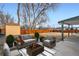 Large and spacious yard with a firepit seating area at 6431 W 77Th Pl, Arvada, CO 80003