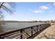 Waterfront view of the lake, and a bridge over it at 9338 W Utah Pl, Lakewood, CO 80232