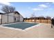 Community pool with a safety cover for off-season use at 9338 W Utah Pl, Lakewood, CO 80232