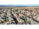 A sprawling residential area boasts many Gathering homes, mature trees, and scenic views of the lake and mountains at 14032 E Chenango Dr, Aurora, CO 80015