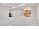 Spacious finished basement with wet bar, kitchenette, and workout area at 14032 E Chenango Dr, Aurora, CO 80015