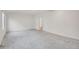 Spacious bedroom with neutral carpeting, ceiling fan and bright lighting at 14032 E Chenango Dr, Aurora, CO 80015