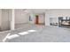 Open living space offers built in shelving, a fireplace, and tons of space to relax and entertain at 14032 E Chenango Dr, Aurora, CO 80015