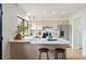 Bright kitchen with ample counter space, modern appliances, and stylish seating at 10310 E Jewell Ave # 57, Aurora, CO 80247