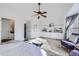 Spacious main bedroom featuring an ensuite bathroom, closet, and lots of light at 11262 Winona Ct, Westminster, CO 80031