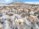 Aerial view showcasing home and surrounding neighborhood in winter at 1585 Old Antlers, Monument, CO 80132