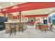 Basement wet bar with stone facing and seating at 1585 Old Antlers, Monument, CO 80132