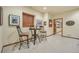 Small basement bar with two stools and a small table at 1585 Old Antlers, Monument, CO 80132