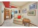 Relaxing basement sitting area with comfortable seating and a side table at 1585 Old Antlers, Monument, CO 80132