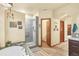 Bathroom with a shower, toilet and double vanity at 1585 Old Antlers, Monument, CO 80132