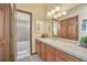 Shared bathroom with tub, shower and double vanity at 1585 Old Antlers, Monument, CO 80132