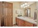 Small bathroom with single vanity and toilet at 1585 Old Antlers, Monument, CO 80132