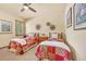 Bedroom with twin beds and window seating at 1585 Old Antlers, Monument, CO 80132