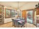 Cozy dining area with hardwood floors and access to the backyard at 1585 Old Antlers, Monument, CO 80132