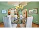 Formal dining room with hardwood floors and a chandelier at 1585 Old Antlers, Monument, CO 80132