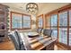 Dining room with wood table and access to backyard at 1585 Old Antlers, Monument, CO 80132