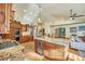 Island kitchen, stainless steel appliances, and granite counters at 1585 Old Antlers, Monument, CO 80132