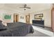 Large main bedroom with plush carpet and access to bath at 1585 Old Antlers, Monument, CO 80132