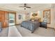 Main bedroom with wood floors and access to patio at 1585 Old Antlers, Monument, CO 80132