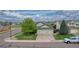 Well-manicured two-story home with an attached two car garage and mature landscaping at 5350 S Quail Way, Littleton, CO 80127
