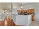 Open kitchen featuring wood cabinets, stone countertops and stainless steel appliances at 5350 S Quail Way, Littleton, CO 80127