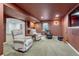 Finished basement lounge area with furniture, television, wet bar, and accent lighting at 5350 S Quail Way, Littleton, CO 80127