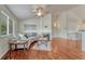 Inviting living room featuring hardwood floors, a fireplace, vaulted ceilings and lots of natural light at 5350 S Quail Way, Littleton, CO 80127