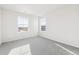 Well-lit bedroom featuring neutral wall paint and plush carpeting at 24955 E 41St Ave, Aurora, CO 80019