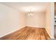 The dining room is spacious and bright, featuring sleek laminate floors and large windows that provide tons of natural light at 350 S Clinton St # 9B, Denver, CO 80247