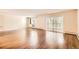 The living room is spacious and bright, featuring sleek laminate floors and large windows that provide tons of natural light at 350 S Clinton St # 9B, Denver, CO 80247