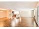 The living room is spacious and bright, featuring sleek laminate floors and large windows that provide tons of natural light at 350 S Clinton St # 9B, Denver, CO 80247