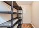 This storage room boasts sturdy metal shelving to keep your items organized and secure at 350 S Clinton St # 9B, Denver, CO 80247