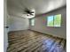Spacious bedroom with lots of natural light, ceiling fan and new wood look floors at 16800 E Bails Pl, Aurora, CO 80017