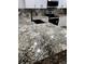 Close up on the kitchen countertop featuring granite and undermount sink with stylish black faucet at 16800 E Bails Pl, Aurora, CO 80017