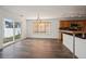 Bright dining area with sliding glass doors and view of the backyard at 5202 Cathay St, Denver, CO 80249