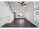 Cozy living room featuring wood-look floors and great natural light at 5202 Cathay St, Denver, CO 80249