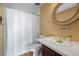 A bathroom that features a golden sink and a mirror with a fancy frame at 2308 Hearth Dr # 28, Evergreen, CO 80439