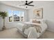 Bright bedroom boasts lots of natural light, plush carpet, and fresh neutral paint at 800 Boulder Peak Ave, Erie, CO 80516