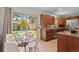 Inviting eat-in kitchen area with stainless steel appliances and sliding glass door to the backyard at 10844 W 68Th Ave, Arvada, CO 80004