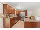 Well-maintained kitchen with granite countertops, stainless steel appliances, and ample cabinet space at 10844 W 68Th Ave, Arvada, CO 80004